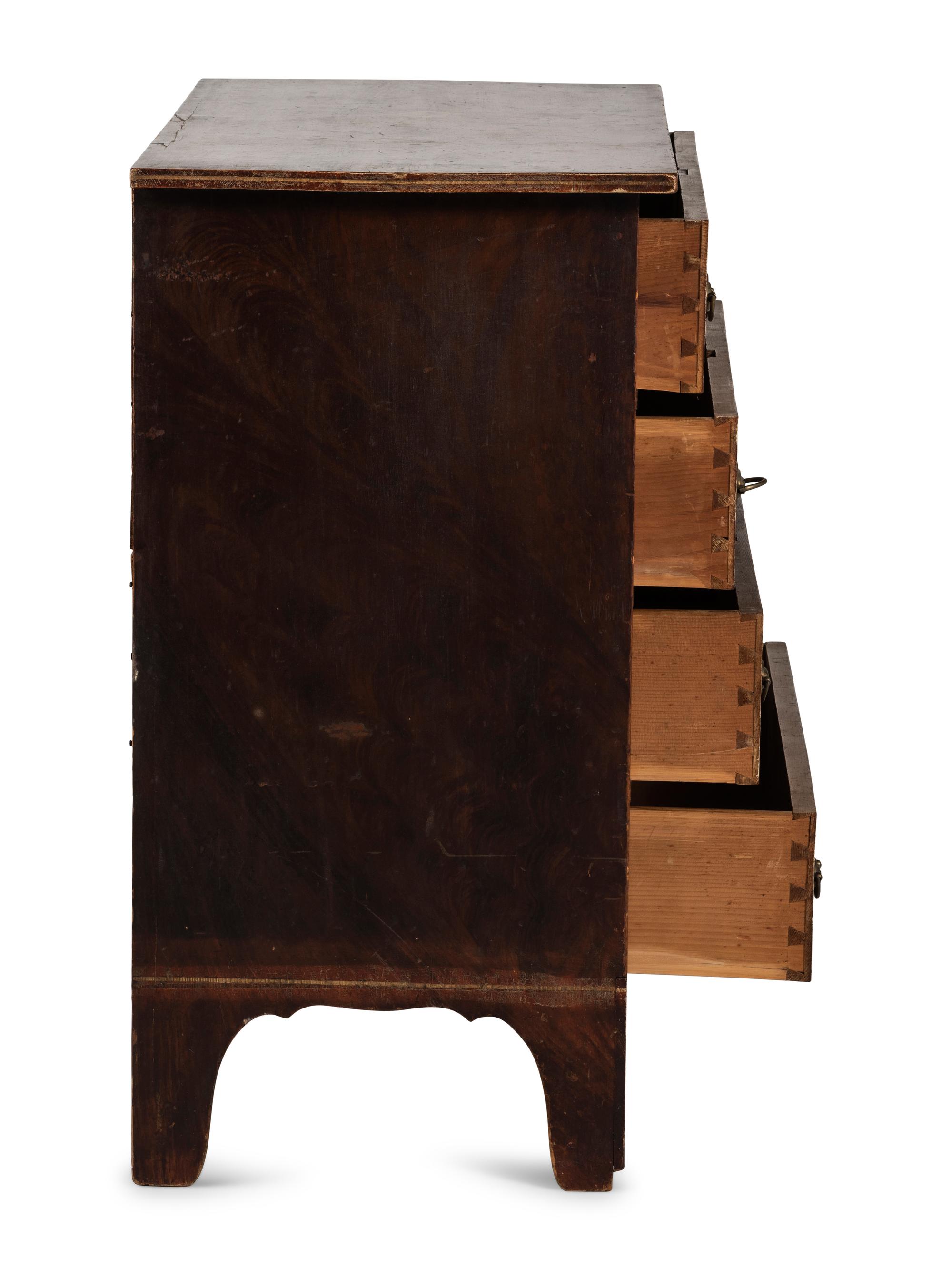 A Federal Grain Painted Pine Chest of Drawers