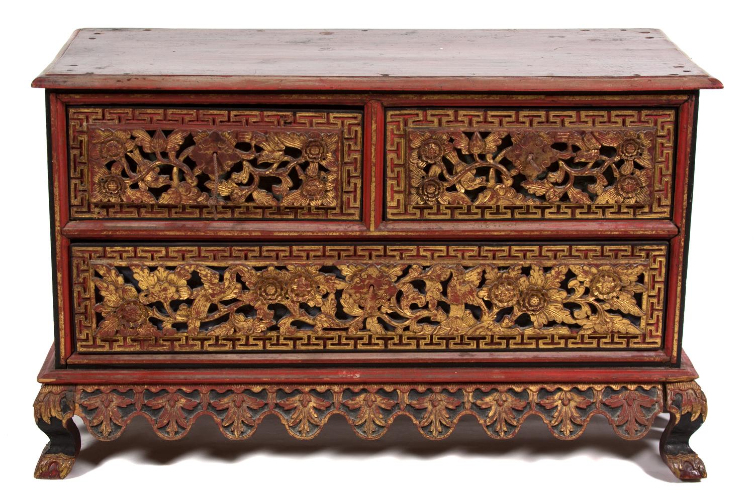 A Chinese Parcel Gilt Red Lacquer Carved Chest on Stand Height 22 x width 36 x depth 16 inches. — 20th CENTURY