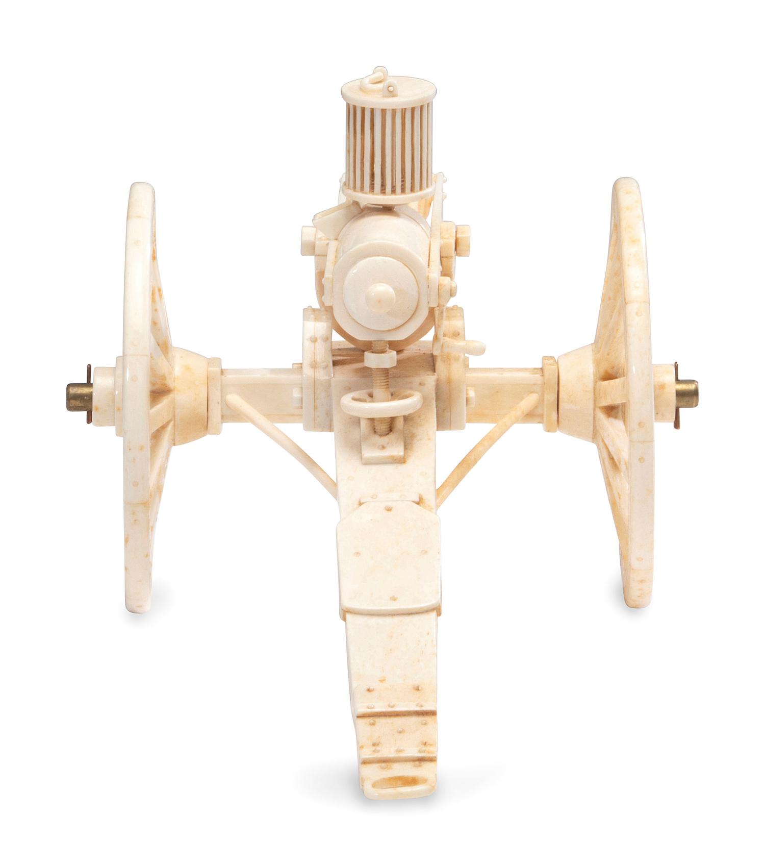 A Carved Walrus Ivory and Bone Gatling Gun Model