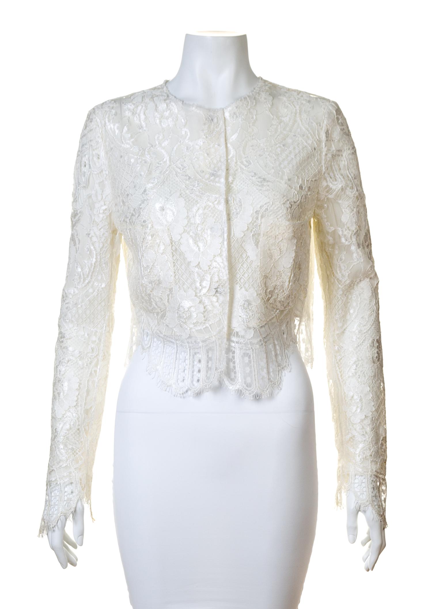 A Dolce & Gabbana Cream Lace Crop Jacket, Size 42.