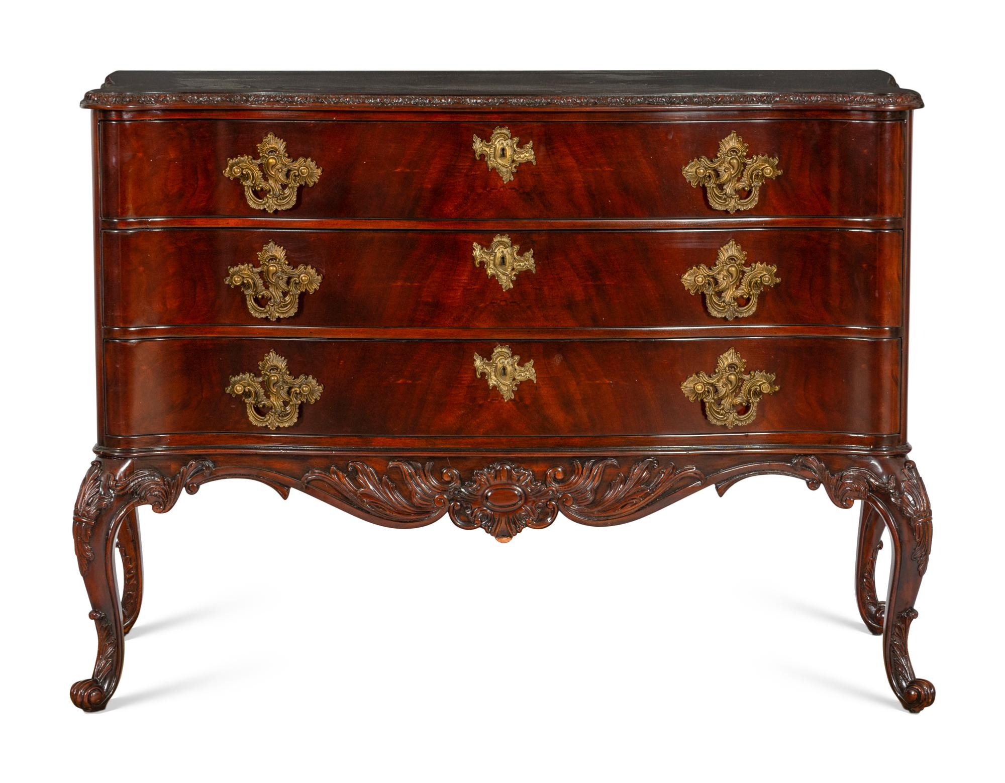A Pair of Ralph Lauren Heiress Carved Mahogany Commodes
