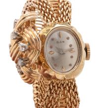 ELGIN, YELLOW GOLD AND DIAMOND SURPRISE WATCH