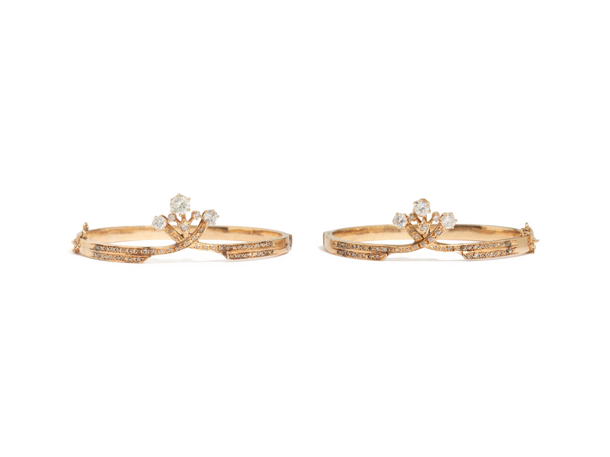 PAIR OF YELLOW GOLD AND DIAMOND BANGLE BRACELETS