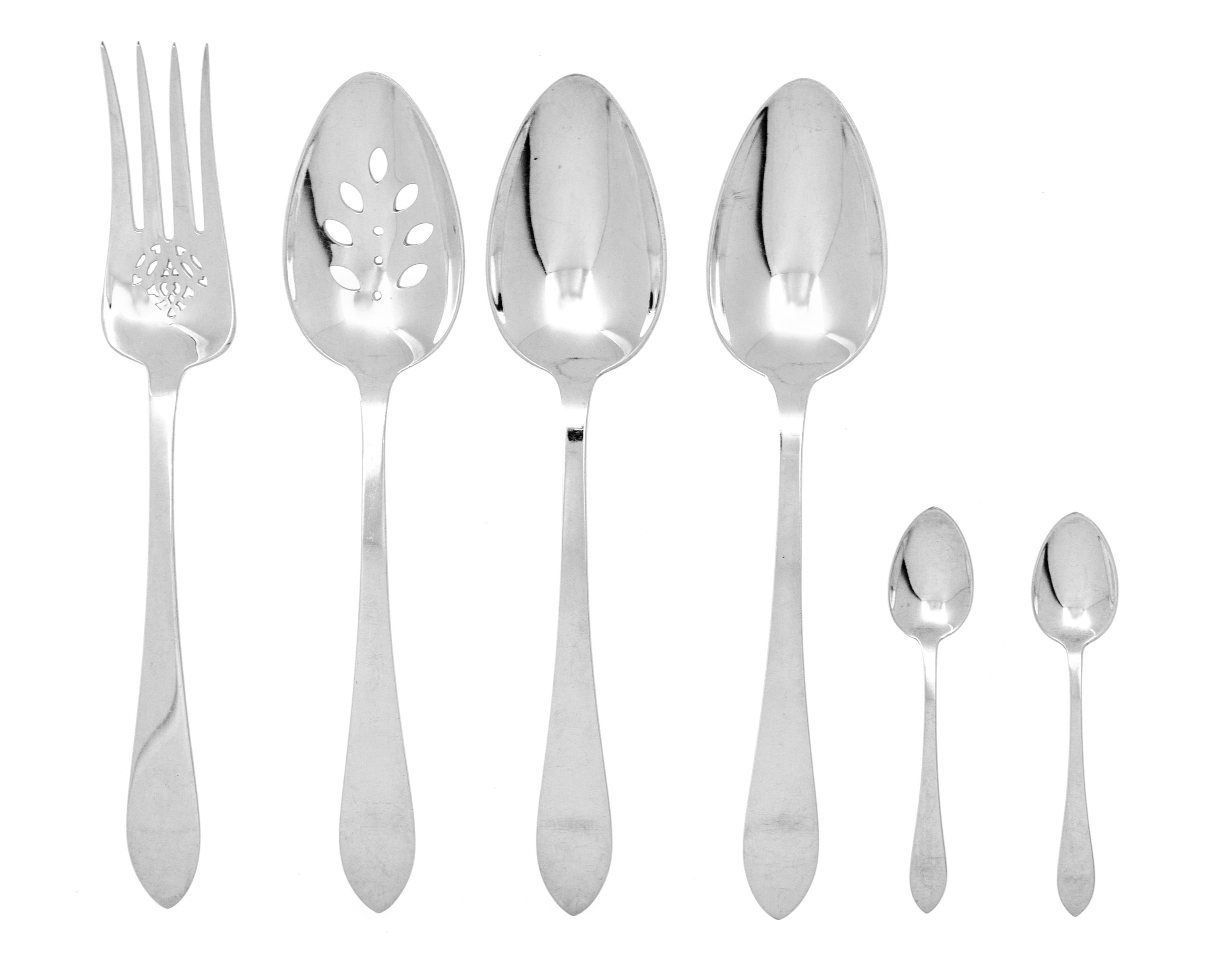 A Group of American Silver Flatware, Tiffany & Co., New York, NY, Faneuil pattern, comprising: 2 tablespoons 1 pierced serving spoon 1