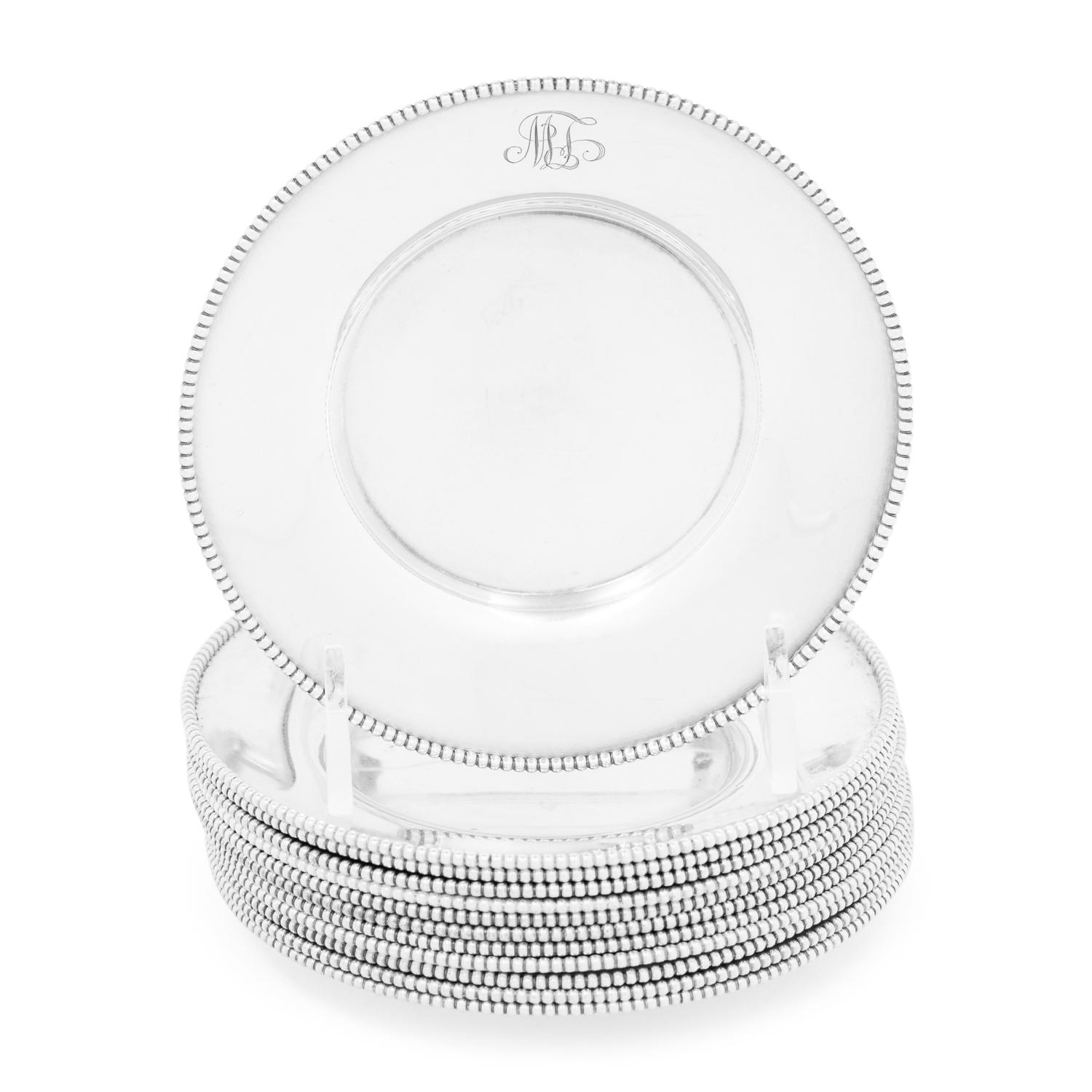 A Set of Twelve American Silver Bread Plates