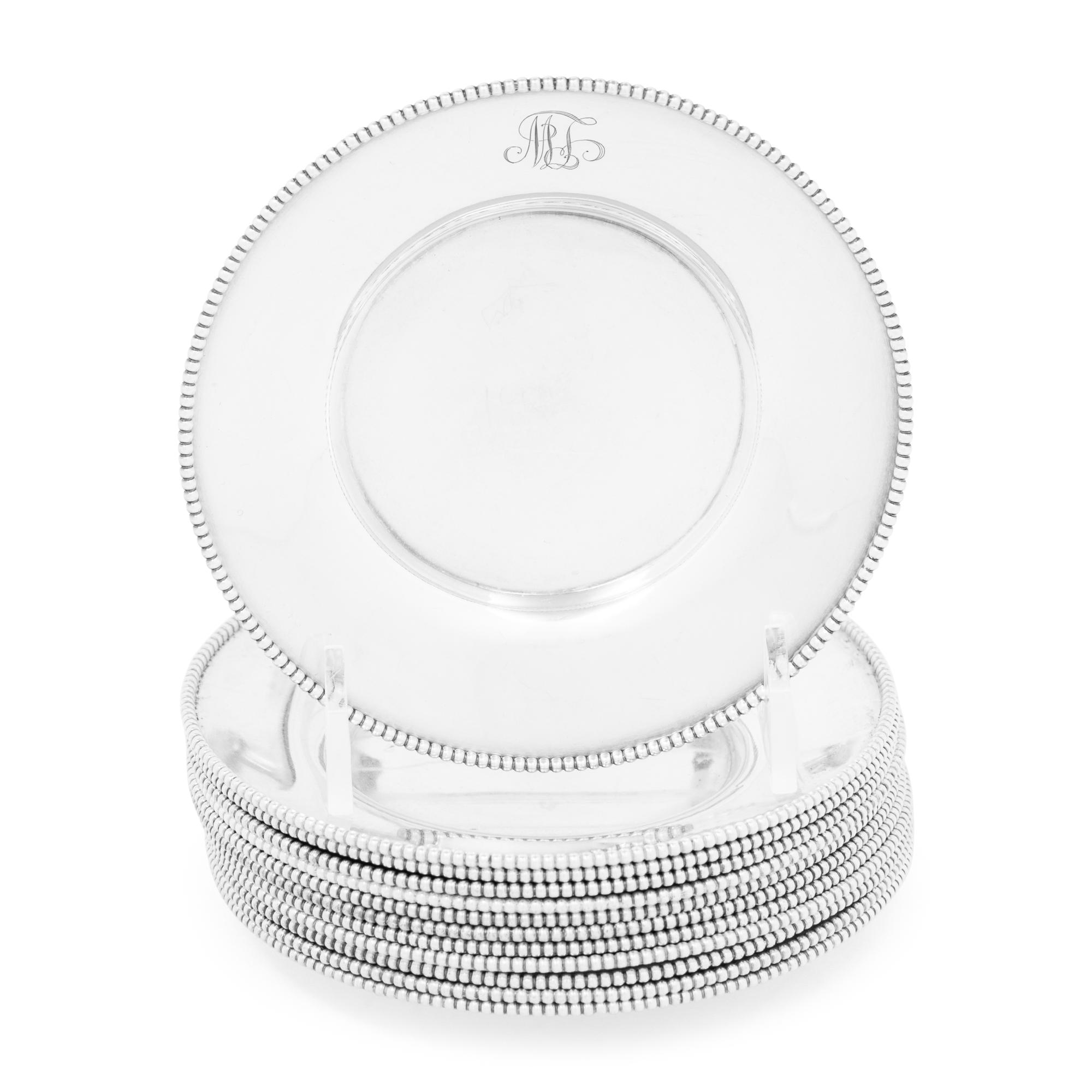 A Set of Twelve American Silver Bread Plates