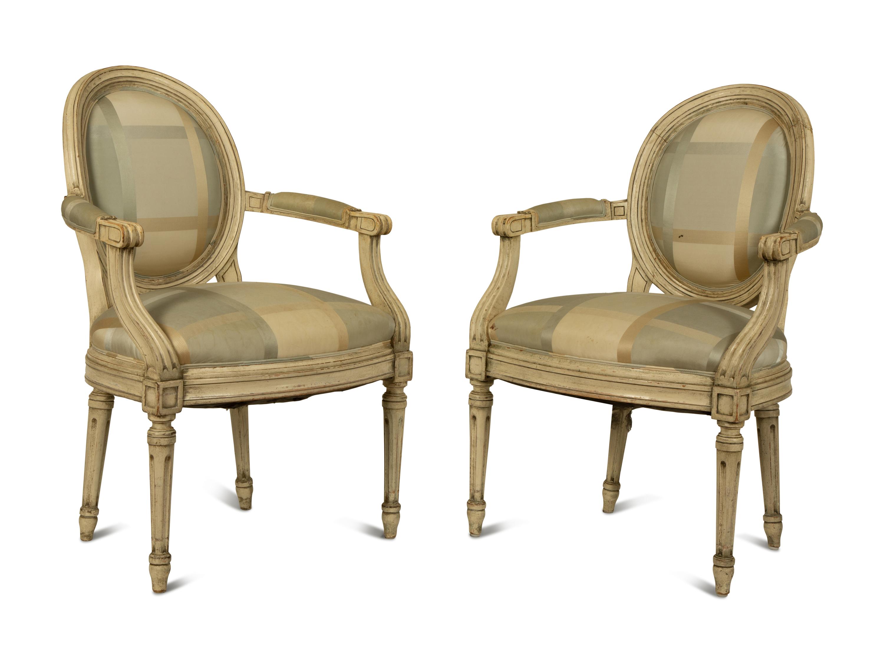 A Pair of Painted Louis XVI Style Painted Fauteuils — 20TH CENTURY