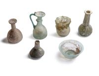 A Group of 8 Roman Glass Vessels
