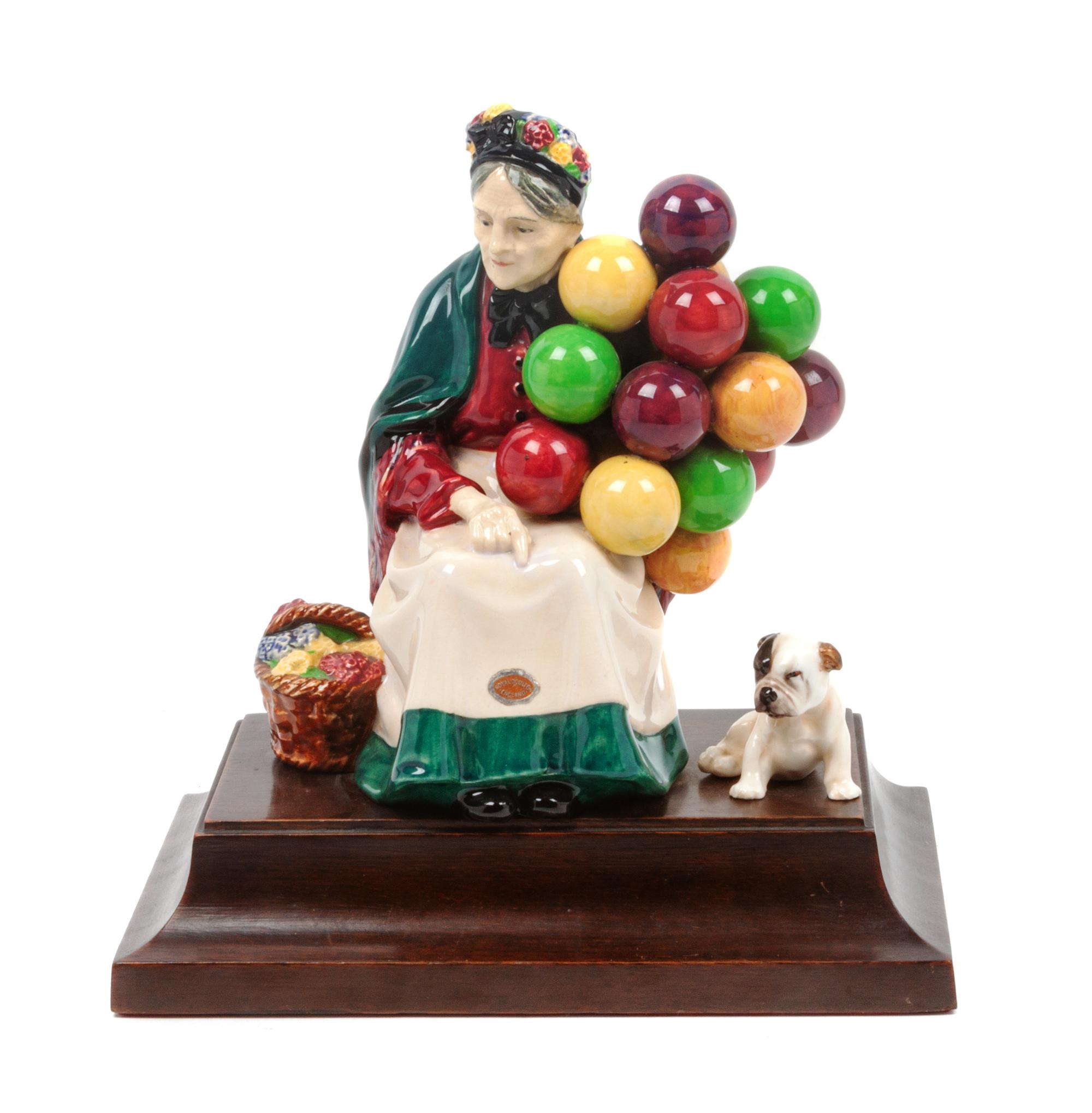 A Royal Doulton English Bulldog Figural Group Height overall 9 1/2 inches.