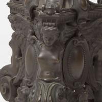 A pair of Renaissance Revival patinated bronze andirons 19th century