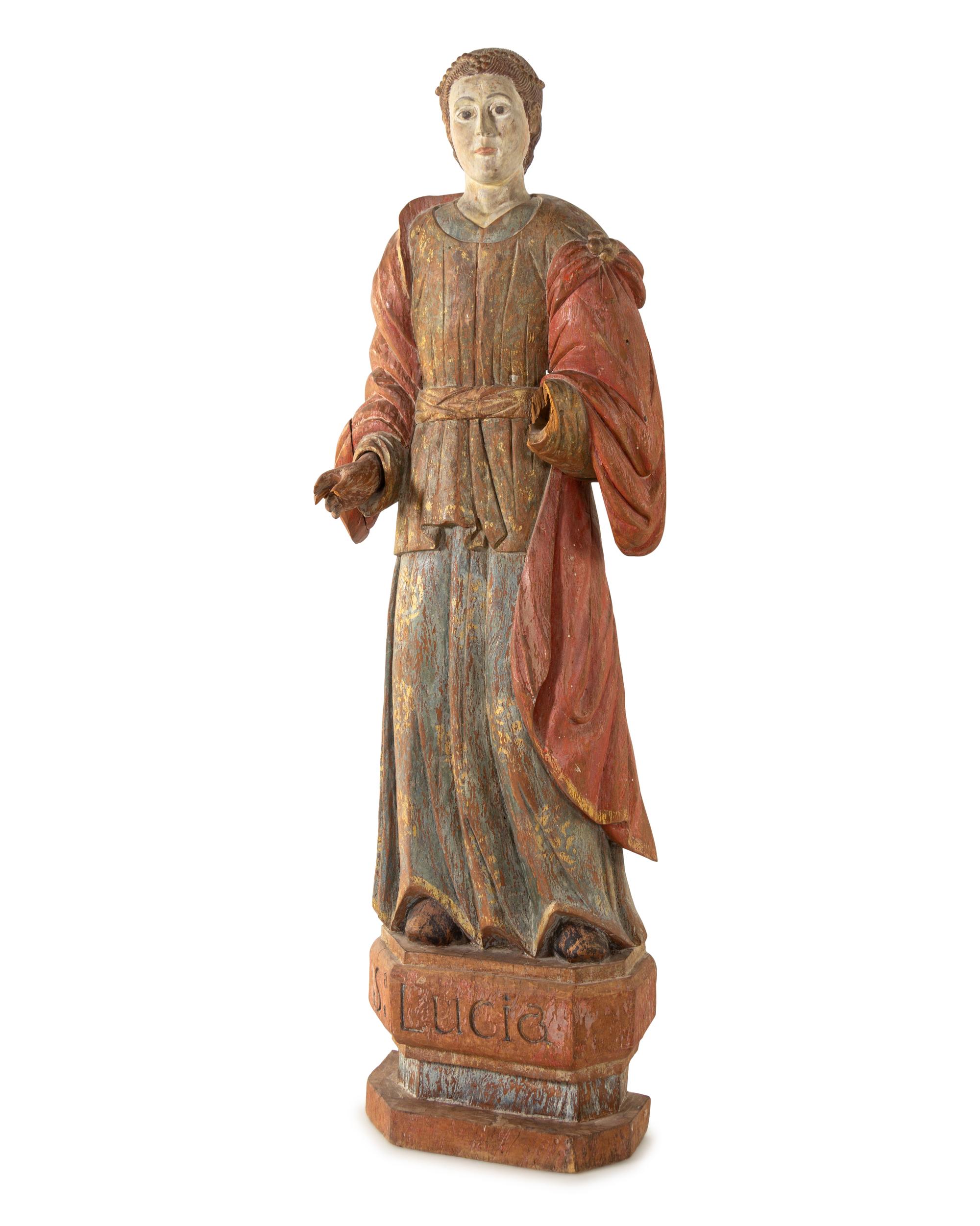 A Continental Carved and Polychromed Santo Figure