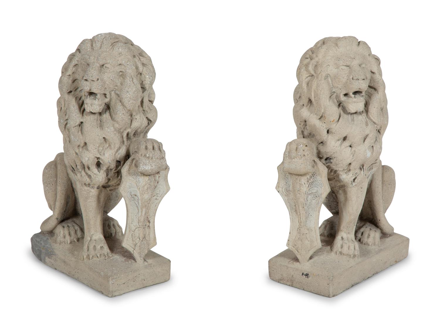 A Pair of Cast Stone Seated Lions