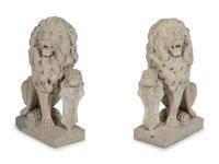 A Pair of Cast Stone Seated Lions