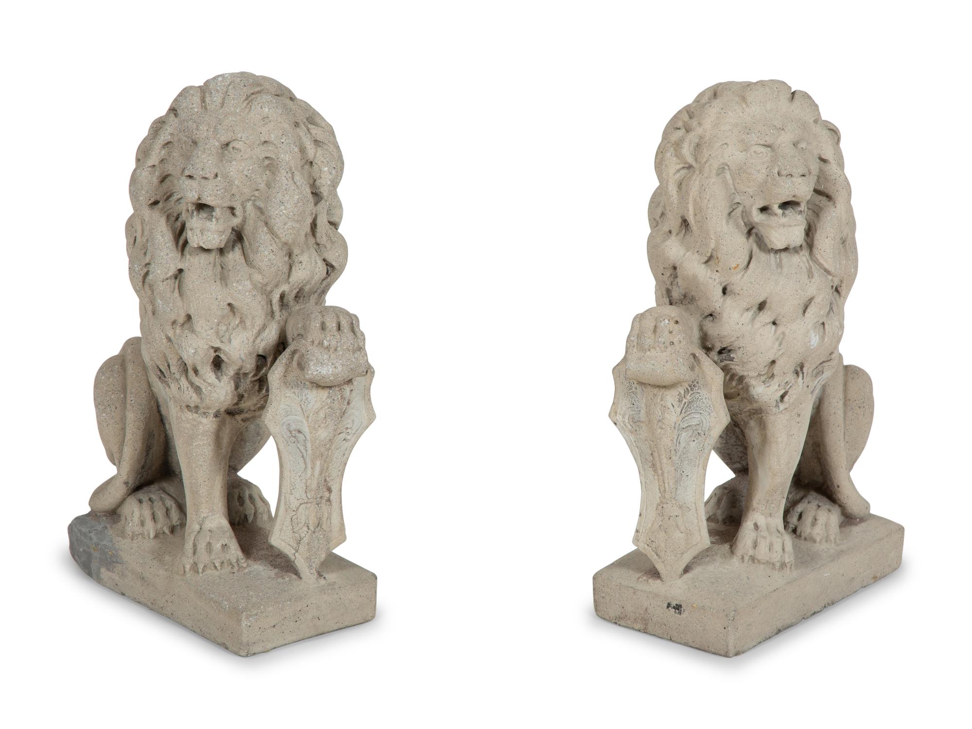 A Pair of Cast Stone Seated Lions