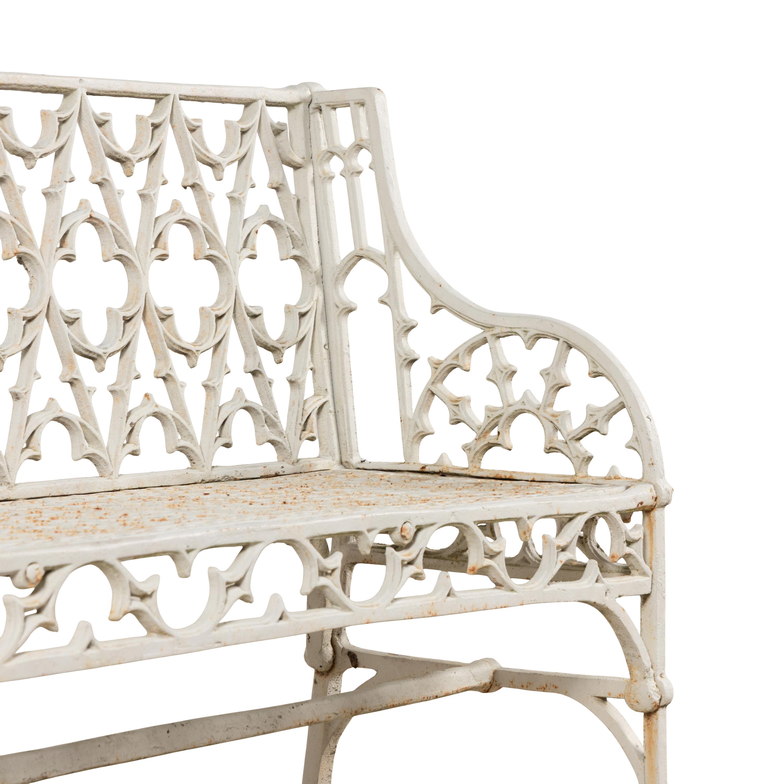 A Victorian Style Painted Iron Bench