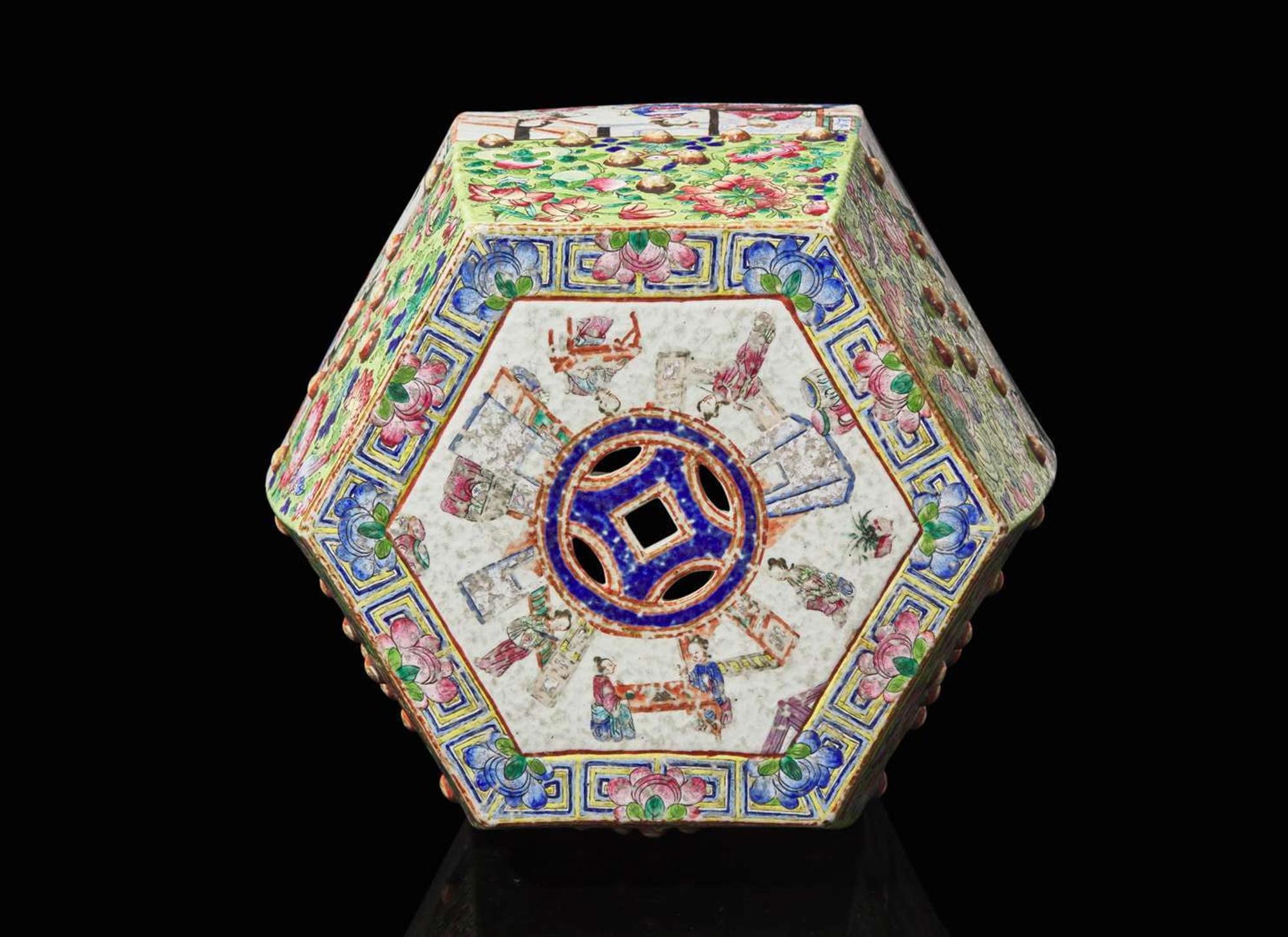 A Chinese famille rose-decorated hexagonal garden stool, late 19th to early 20th century 粉彩開光繡墩 十九世紀晚至二十世紀初