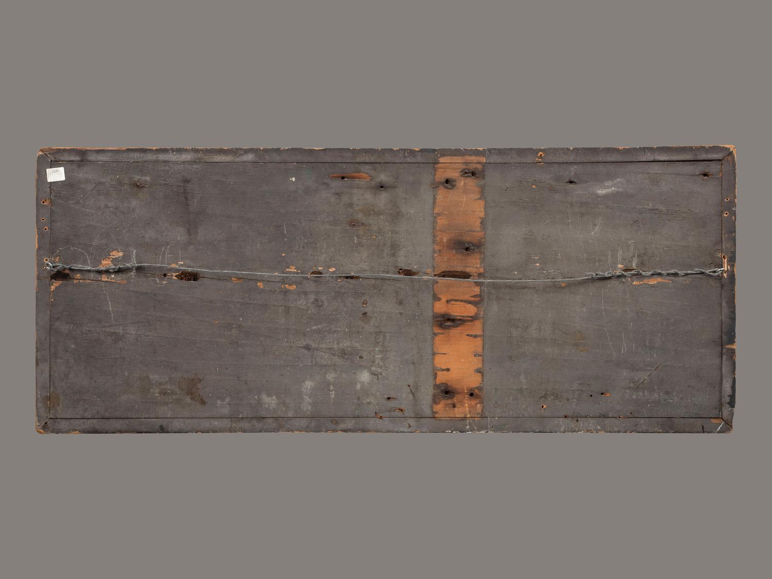 A Carved, Black and Gold Painted Pine Trade Sign