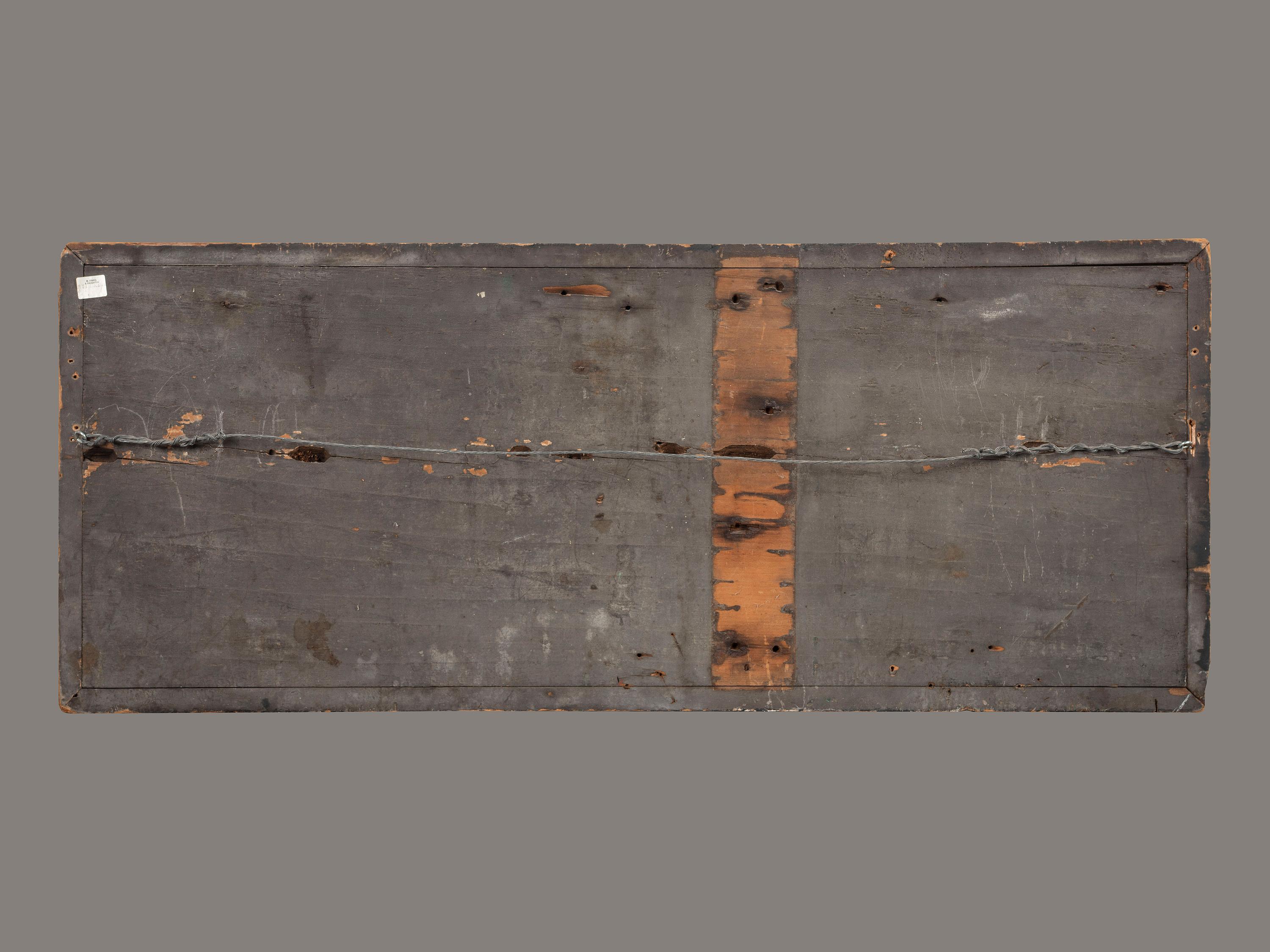 A Carved, Black and Gold Painted Pine Trade Sign