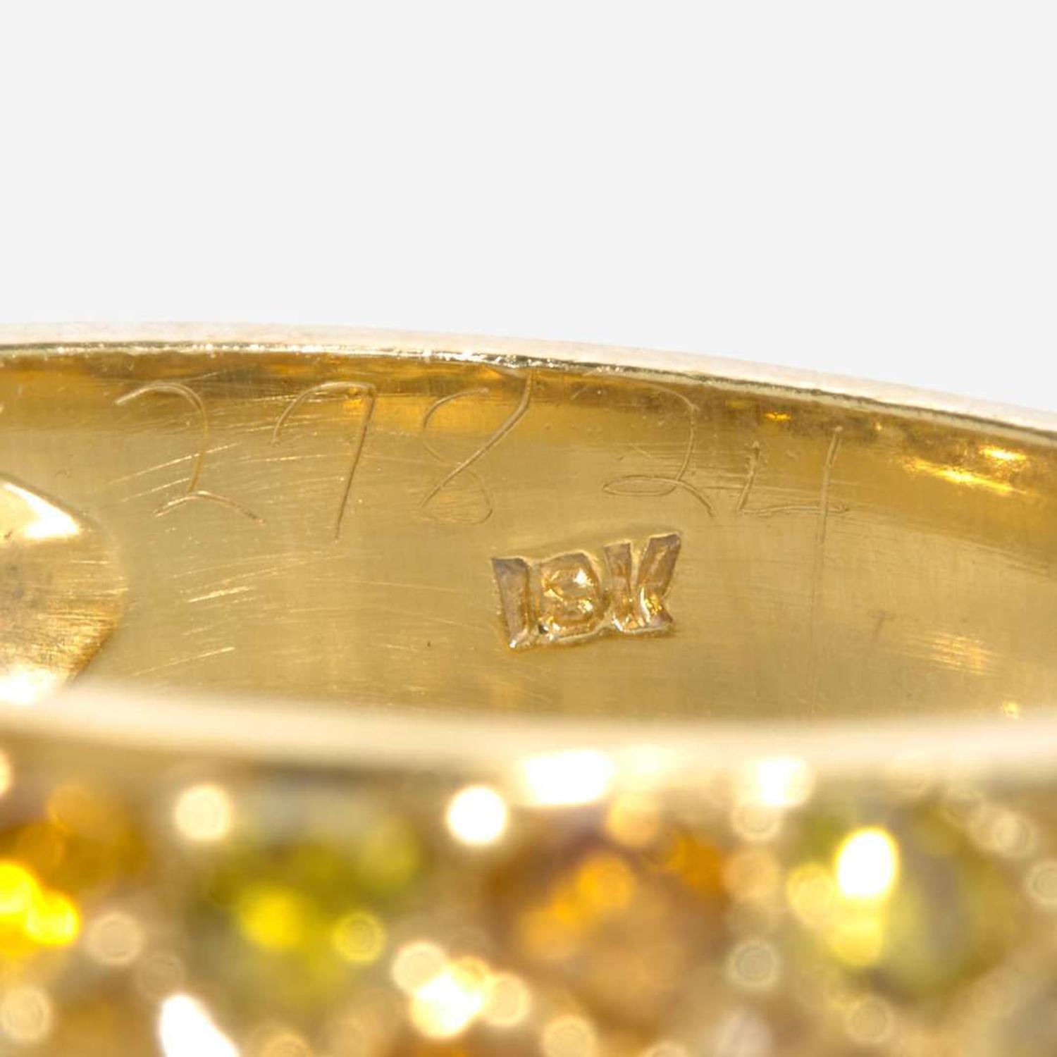 A Set of 18K Yellow Gold and Diamond Rings