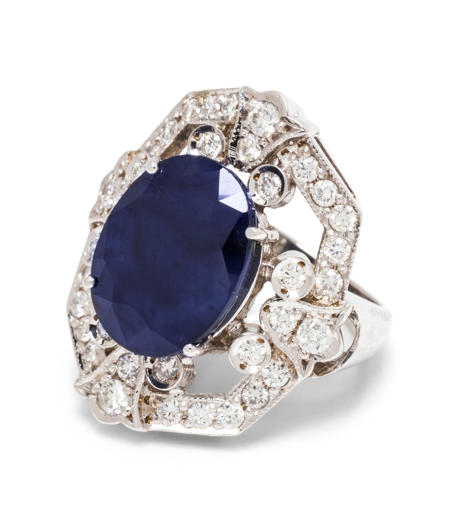 A 14 Karat White Gold, Sapphire and Diamond Ring,