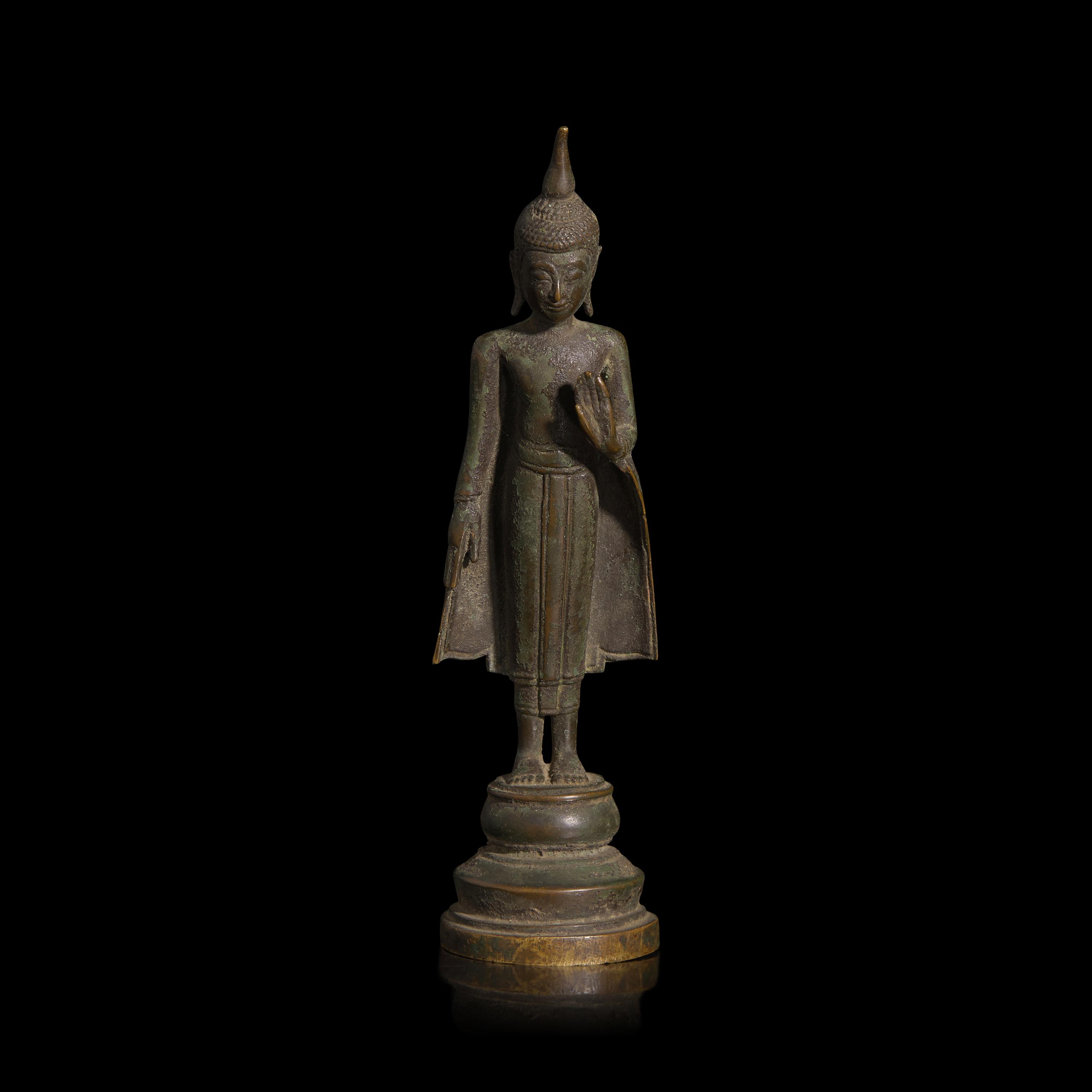 An Eastern Thai Bronze 'Leaning Buddha', 17th–18th Century