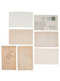 [EARLY PHOTOGRAPHY]. A group of 8 real photo postcards featuring African American subjects, including: