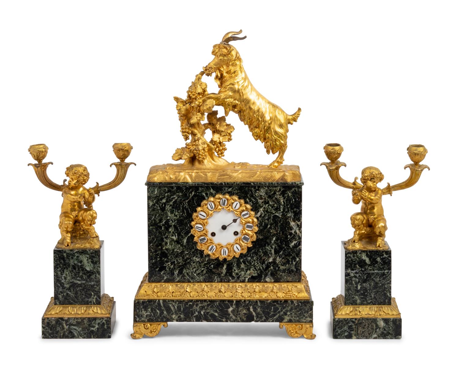 An Assembled Louis Philippe Marble and Gilt Bronze Figural Garniture