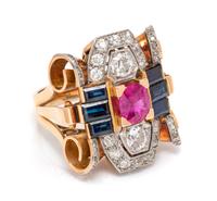 A Retro Platinum Topped Rose Gold, Ruby, Diamond and Sapphire Ring, 10.30 dwts.