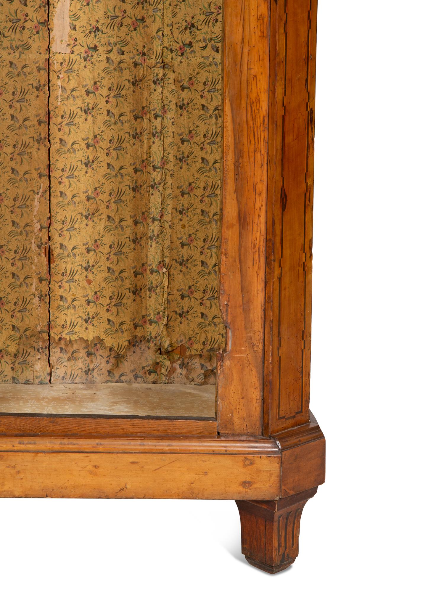 A Continental Olivewood Armoire