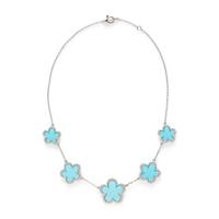 WHITE GOLD, DIAMOND, AND HARDSTONE FLOWER STATION NECKLACE