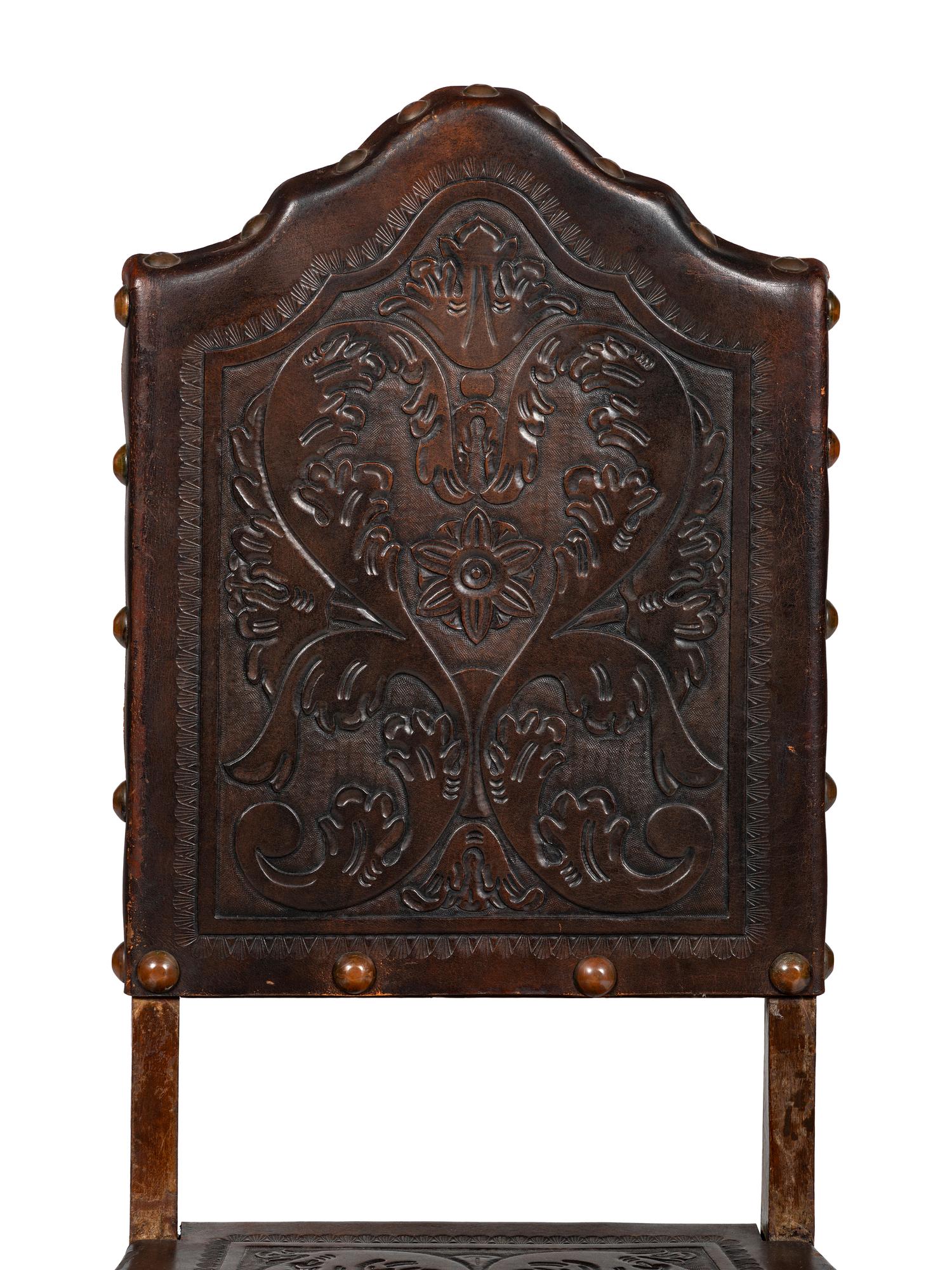 Six Mizner Carved Walnut and Embossed Leather Back Side Chairs