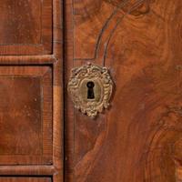 A William & Mary oyster veneered walnut secretary bookcase circa 1700