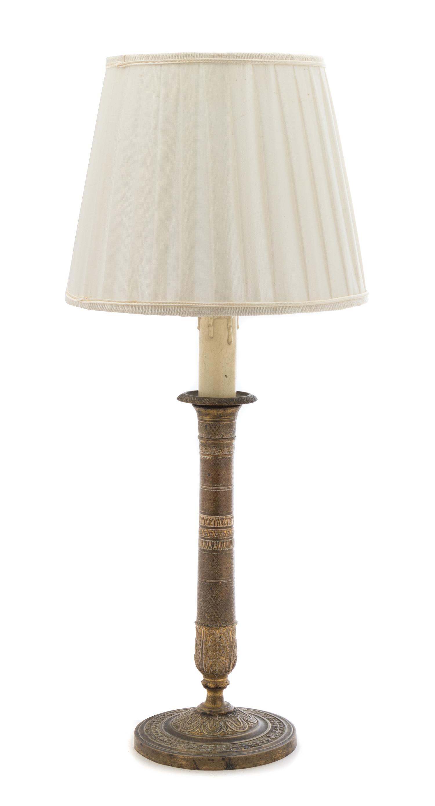 An Empire Style Gilt Metal Candlestick Height overall 18 inches. — 19TH CENTURY