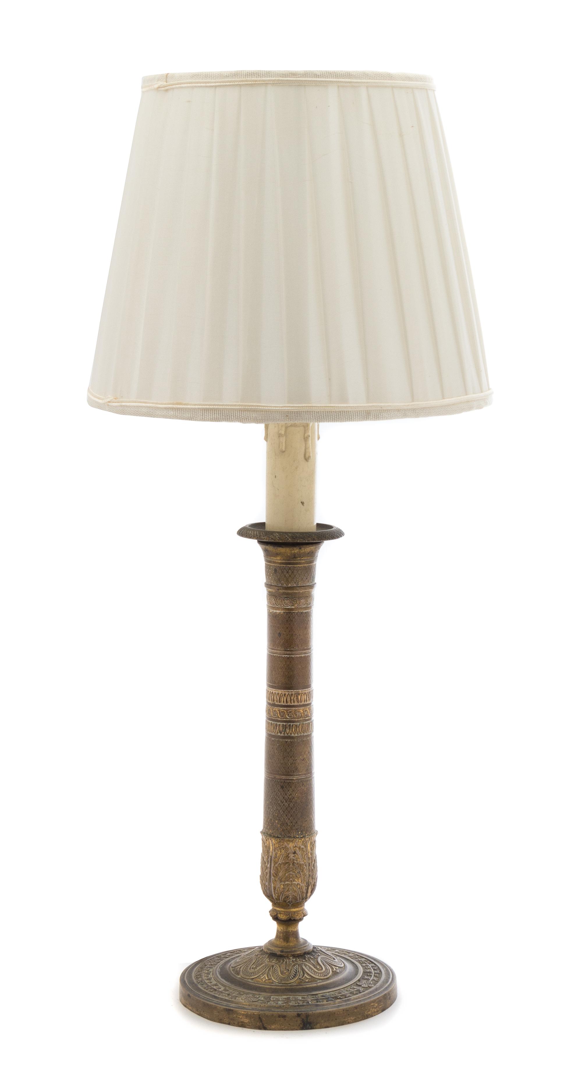 An Empire Style Gilt Metal Candlestick Height overall 18 inches. — 19TH CENTURY