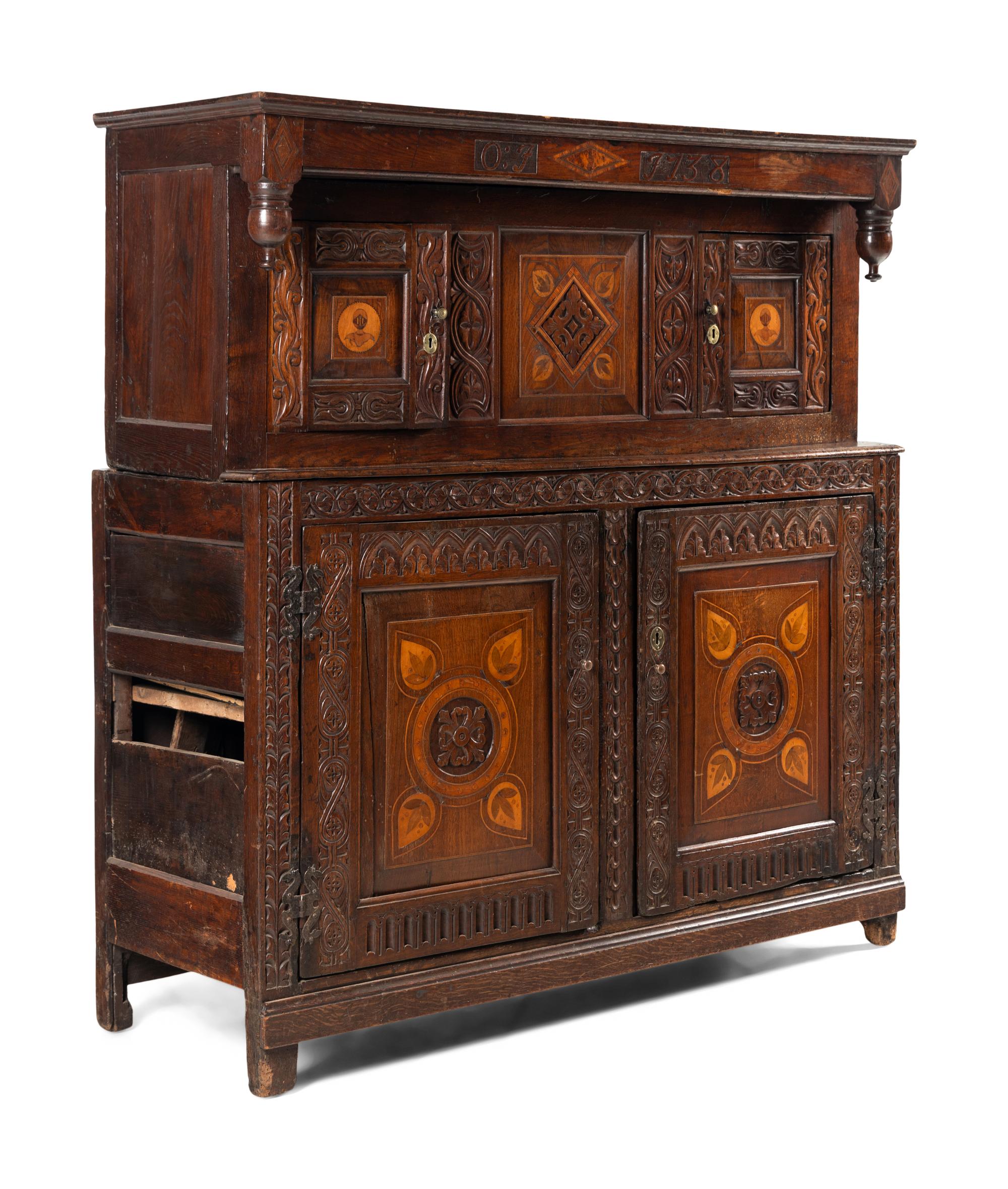 A Jacobean Carved Oak and Marquetry Court Cupboard