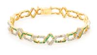 A Platinum Topped Gold, Diamond and Emerald Bracelet, 11.50 dwts.