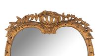 A Rococo Carved Giltwood Mirror