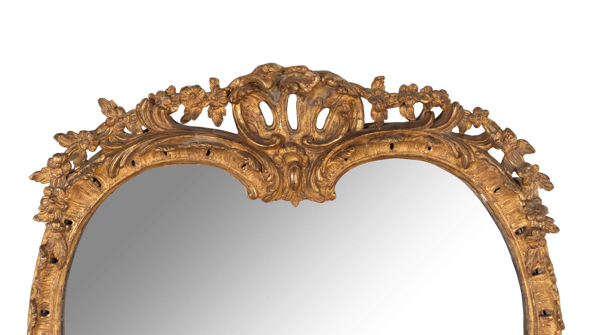 A Rococo Carved Giltwood Mirror