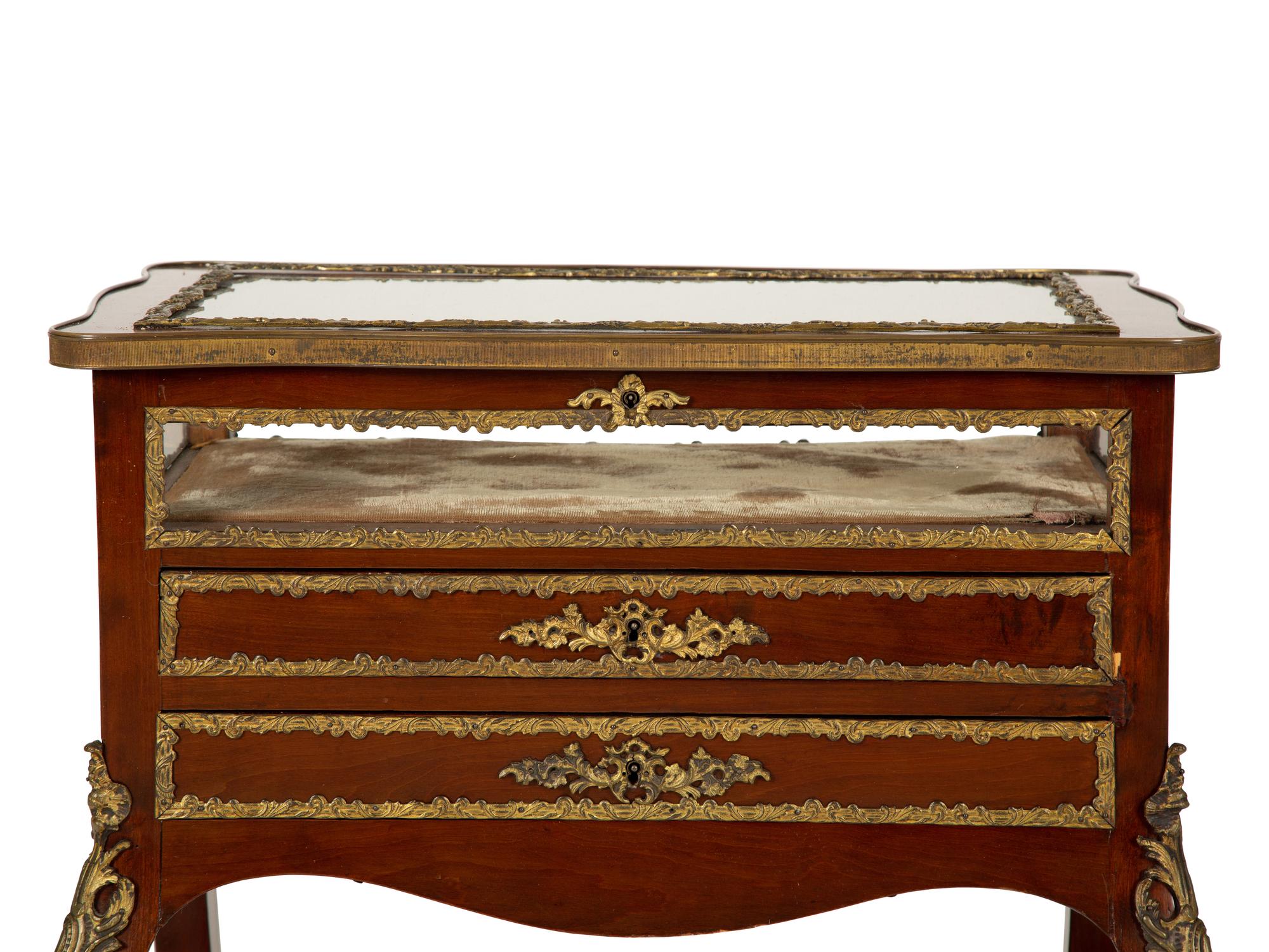 A Louis XV Style Gilt Bronze Mounted Mahogany Vitrine Table