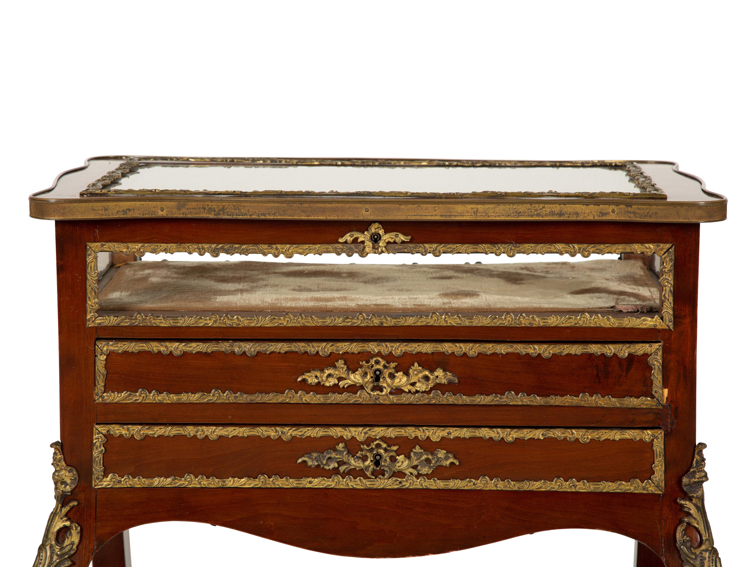 A Louis XV Style Gilt Bronze Mounted Mahogany Vitrine Table