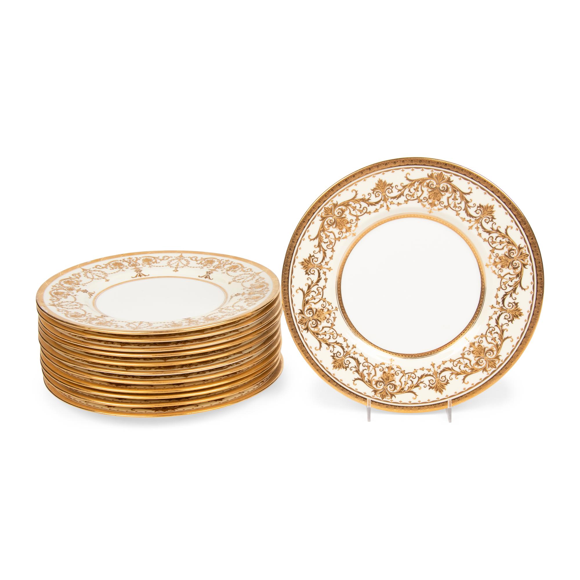 A Set of Twelve Minton Parcel-Gilt Porcelain Plates