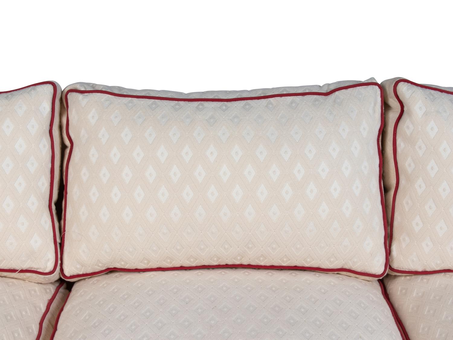 An Upholstered Three-Seat Sofa
