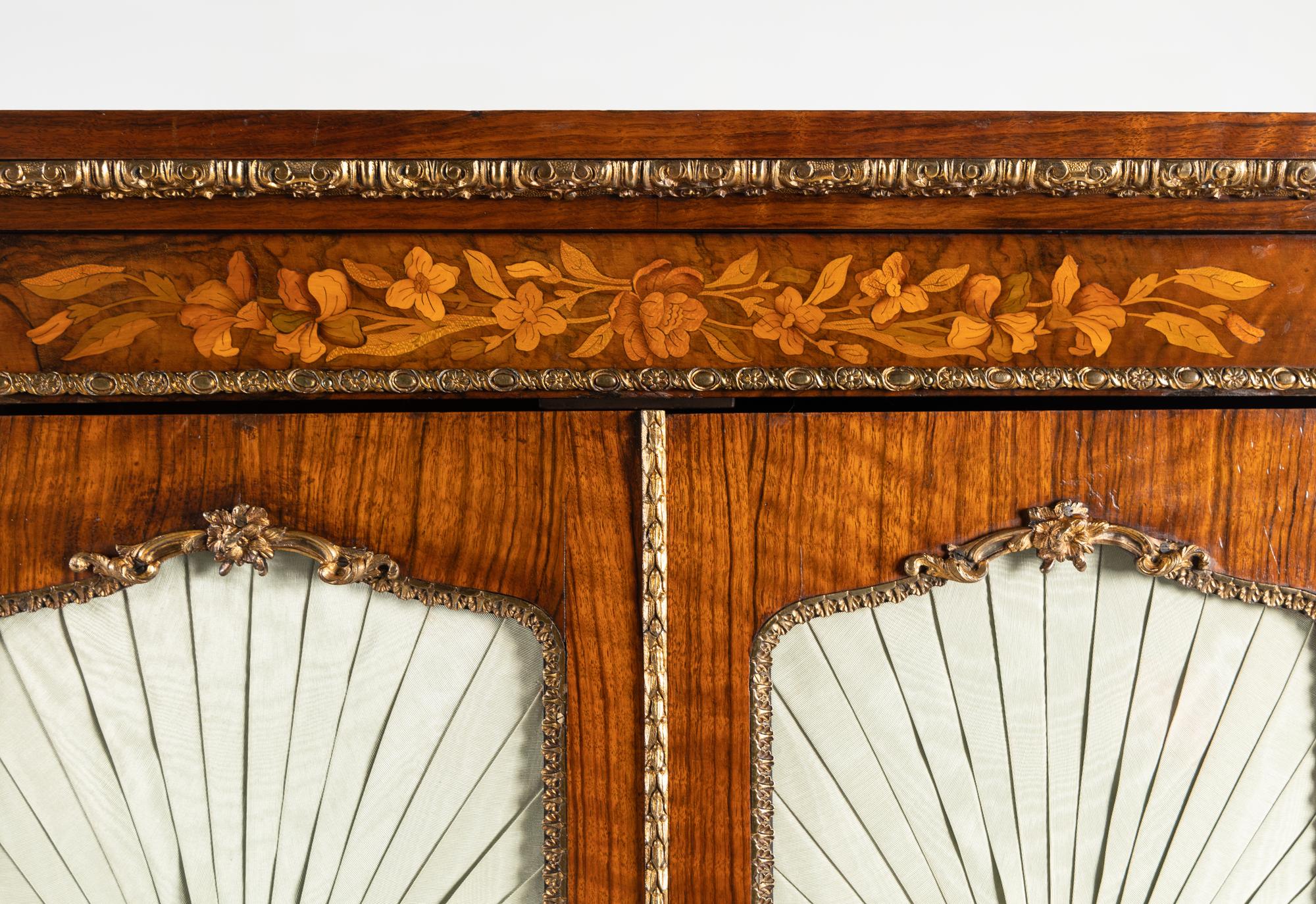 A French Gilt Bronze Mounted Rosewood, Walnut and Marquetry Cabinet