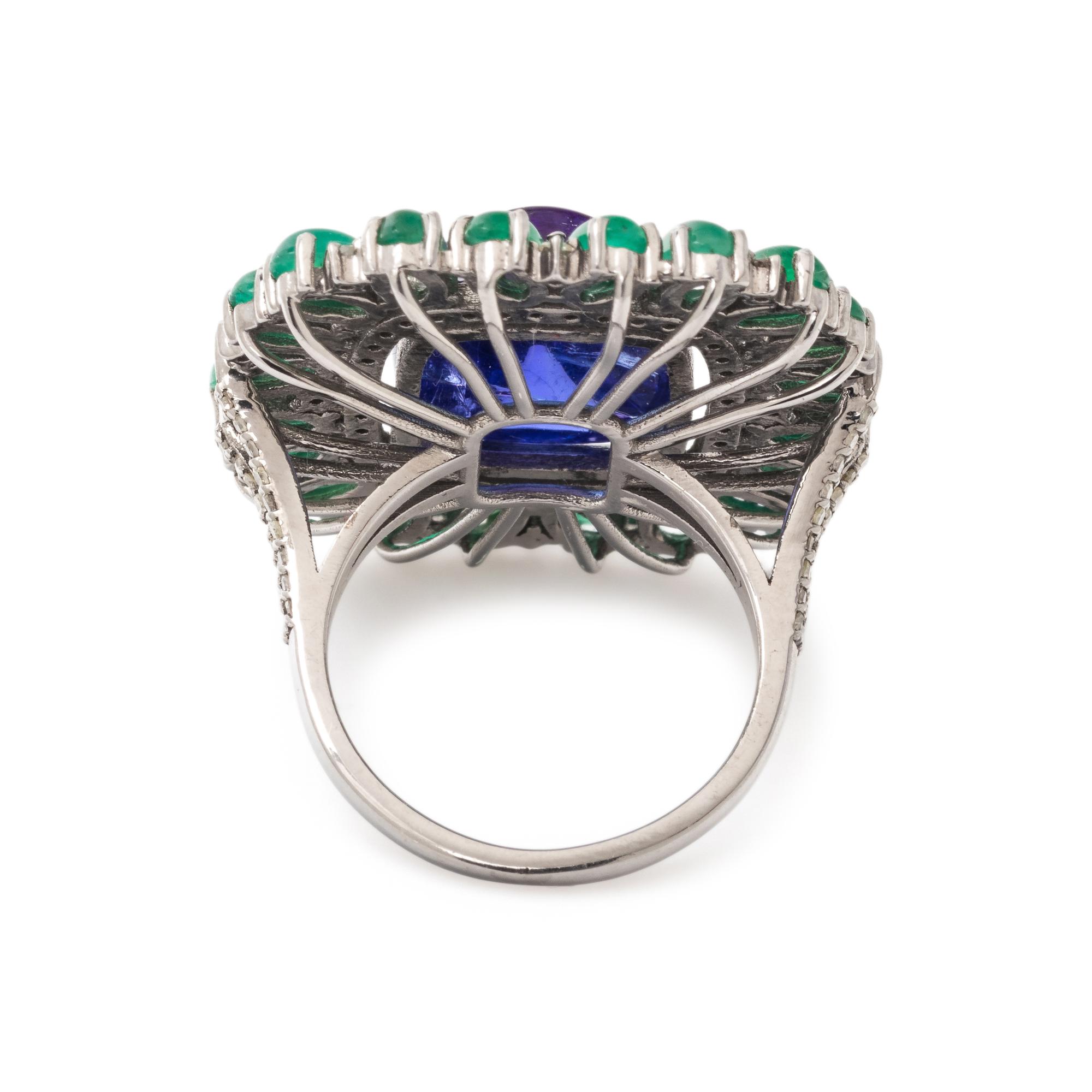 TANZANITE, EMERALD AND DIAMOND RING