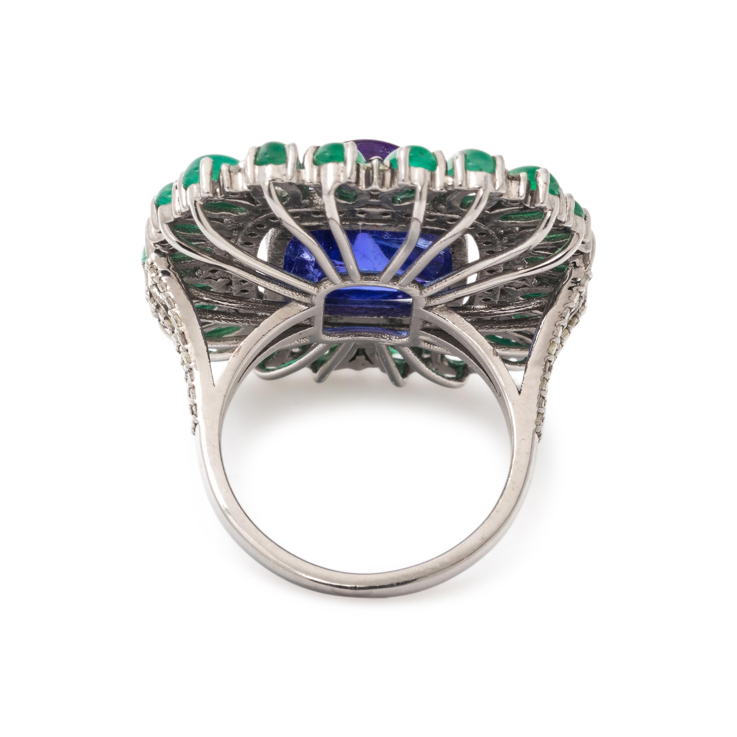 TANZANITE, EMERALD AND DIAMOND RING
