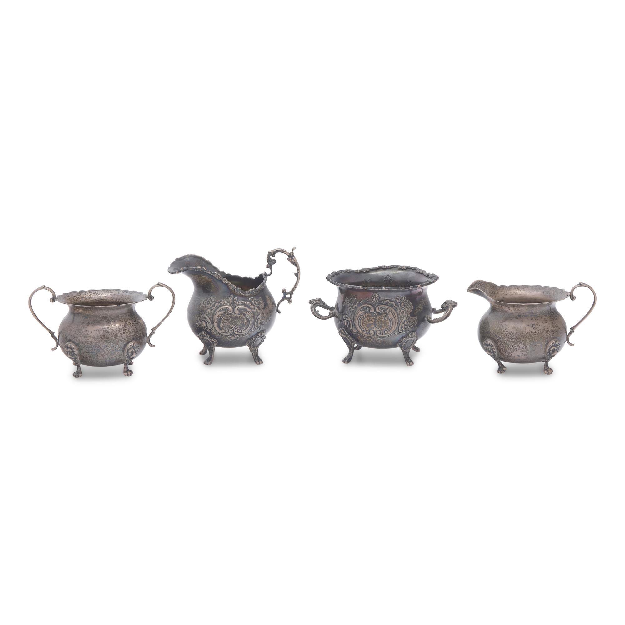 A Group of Twelve Silver Table Articles