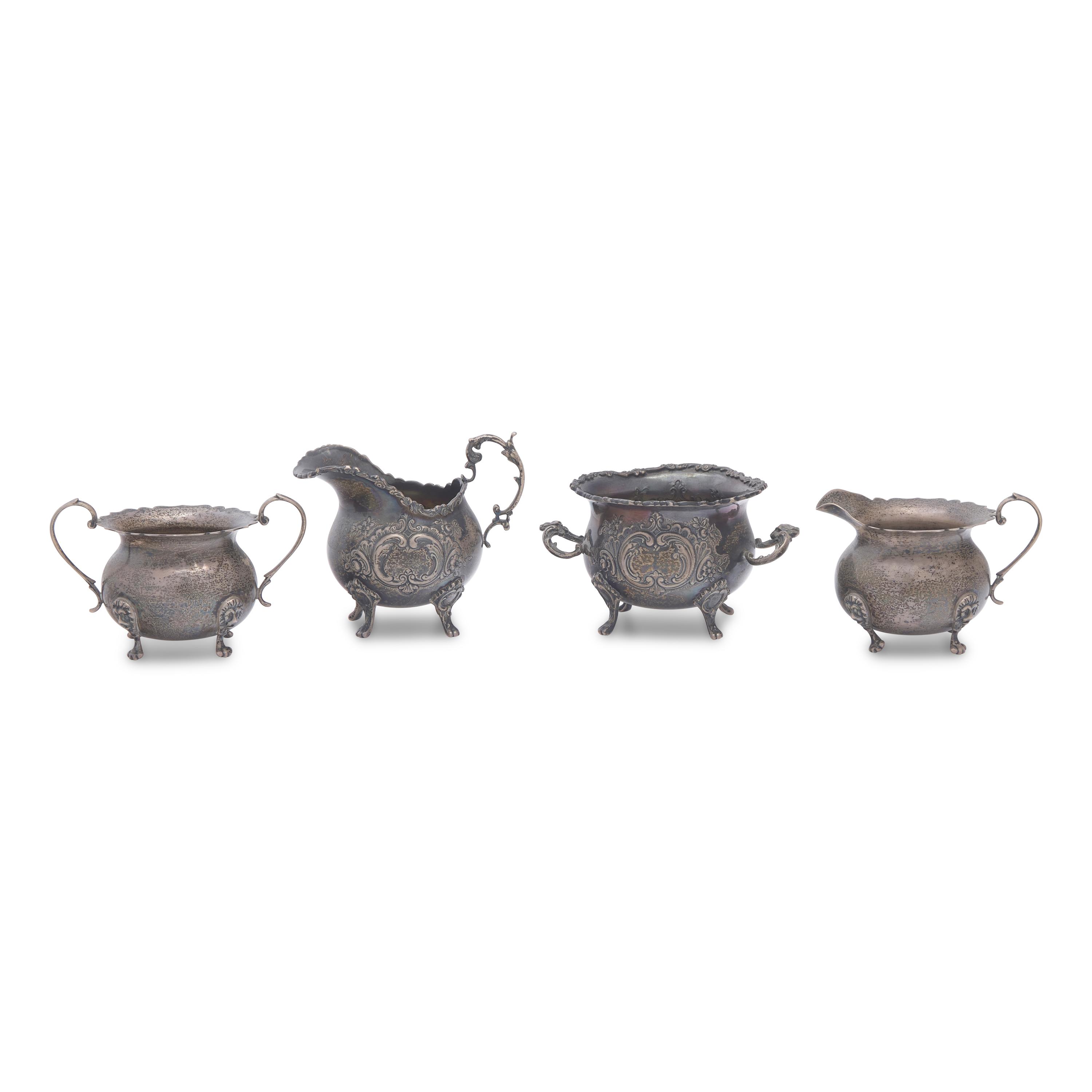 A Group of Twelve Silver Table Articles