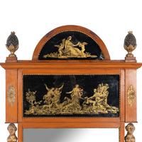 A Neoclassical Birch, Verre Églomisé and Parcel-Gilt Mirror