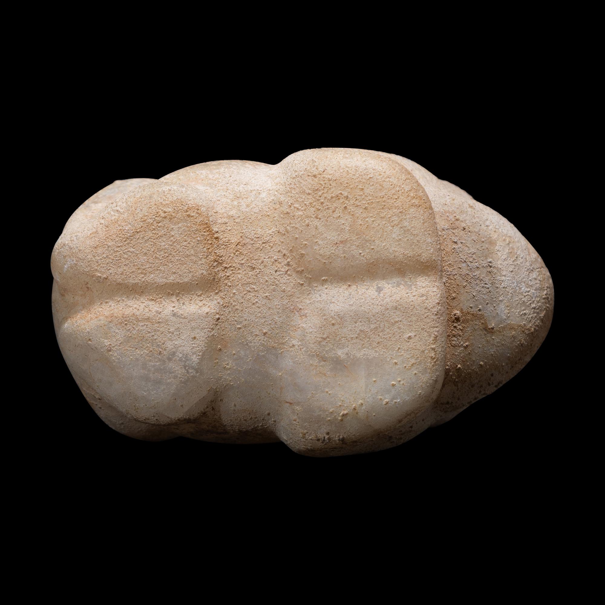 An Egyptian Calcite Frog Vessel