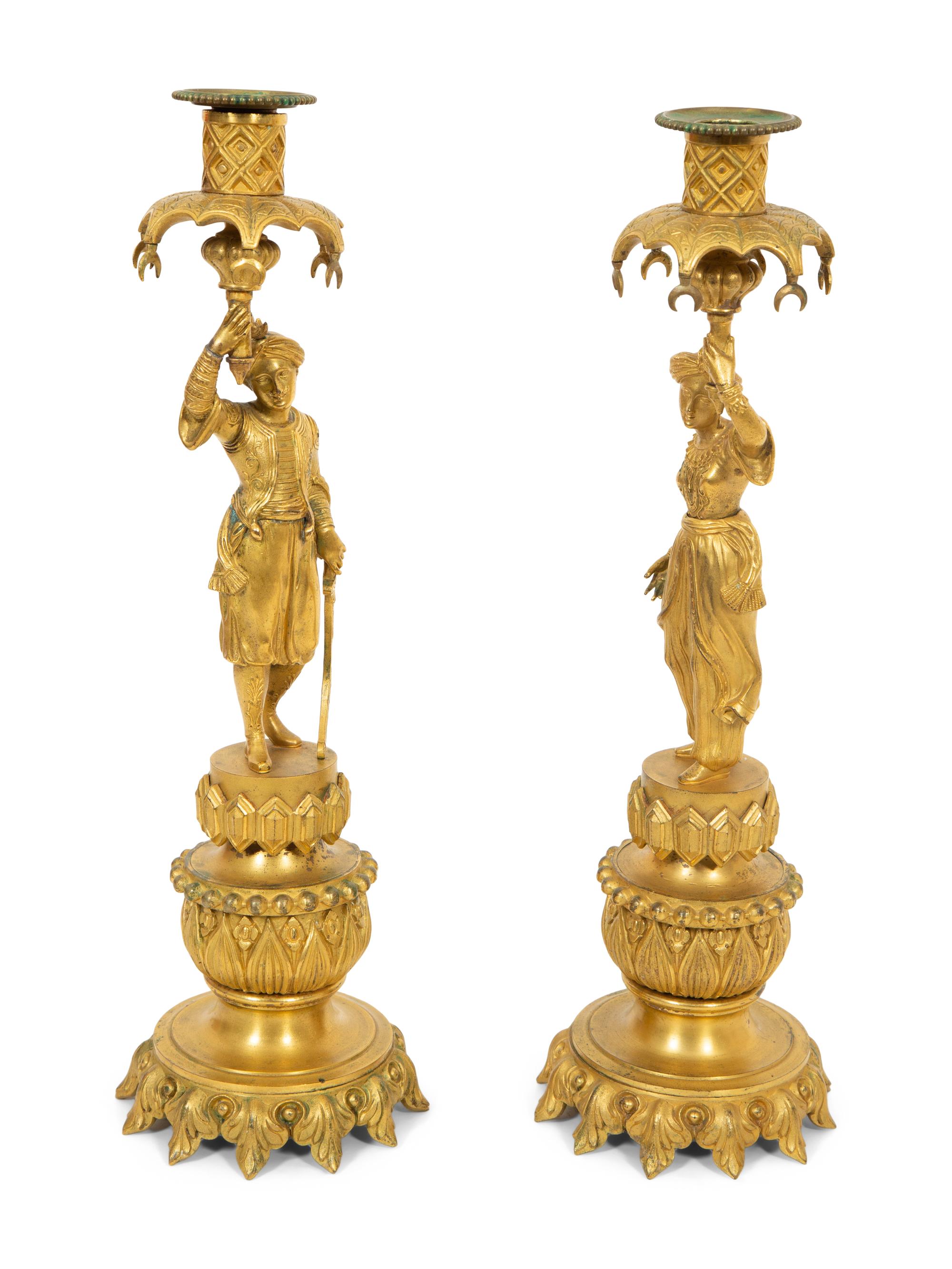 A Pair of Continental Gilt Bronze Candlesticks